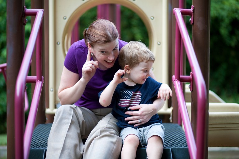 Mother and son listening
